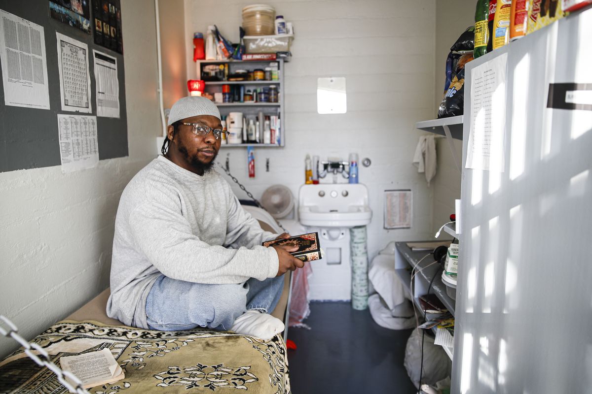 File-In this Feb. 13, 2020, file photo, Myon Burrell sits inside his cell at the Minnesota Correctional Facility in Stillwater. A national panel of legal experts recommended the immediate release of Burrell, who was sentenced to life in prison as a teenager nearly two decades ago.  (John Minchillo)