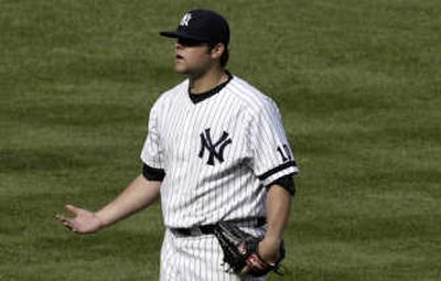 
Yankees pitcher Joba Chamberlain reacts after being ejected Thursday.Associated Press
 (Associated Press / The Spokesman-Review)