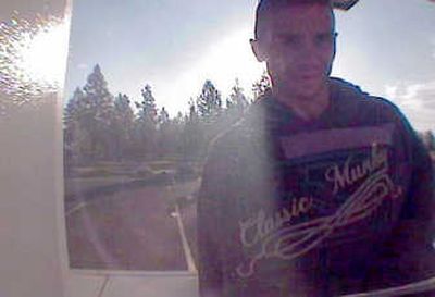 
An ATM captured the image of a man using a credit card that was stolen from the Quality Inn, 7919 N. Division in Spokane, last month.  Photo courtesy of Spokane County sheriff
 (Photo courtesy of Spokane County sheriff / The Spokesman-Review)