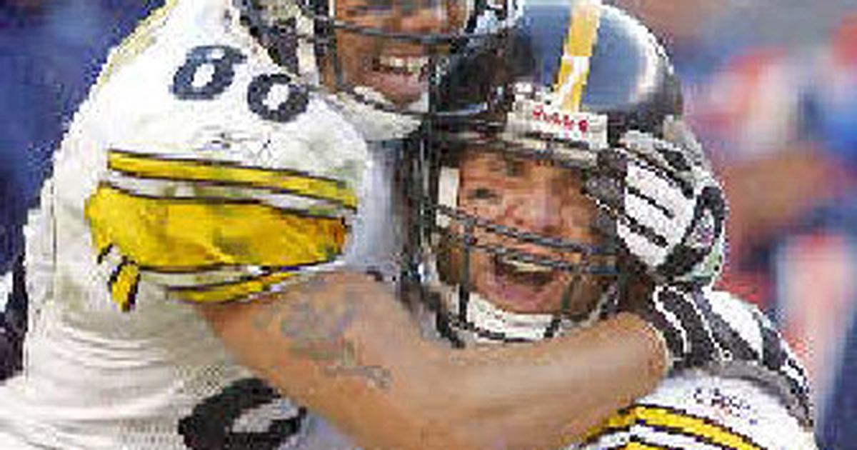 Linebacker Ian Gold of the Denver Broncos celebrates during the