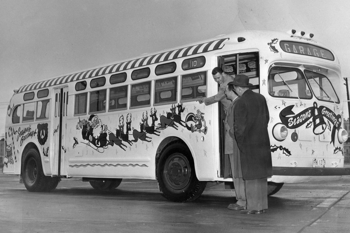 1951: Spokane City Lines officials show off a holiday bus design. City Lines had taken over the city bus system from Spokane United Railway, a subsidiary of Washington Water Power, in 1945. The private company tried to lure bus riders with the promise of convenient service to holiday shopping areas, but ridership declined drastically through the 1950s and 1960s. (Photo Archives/spokesman-review)