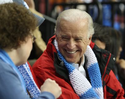 ORG XMIT: IDMC104 Vice President Joe Biden talks with the mother of an athlete during the Special Olympics ice skating pairs competition on Thursday, Feb. 12, 2009 in Boise, Idaho. During a speech, he said the Obama administration was committed to programs designed to improve the livelihood of Americans with disabilities and special needs. He lauded the bravery, tenacity and grit of the competitors. Biden arrived in Boise to take part in the festivities of the Special Olympics. (AP Photo/Matt Cilley) (Matt Cilley / The Spokesman-Review)