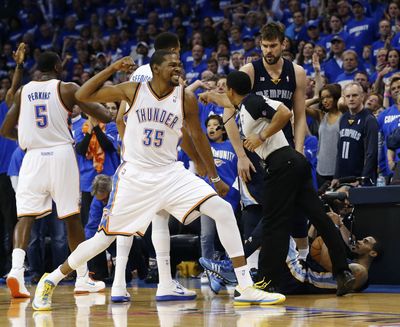 Oklahoma city’s Kevin Durant reacts after Memphis’ Mike Conley was ruled out of bounds, giving the ball to the Thunder. (Associated Press)