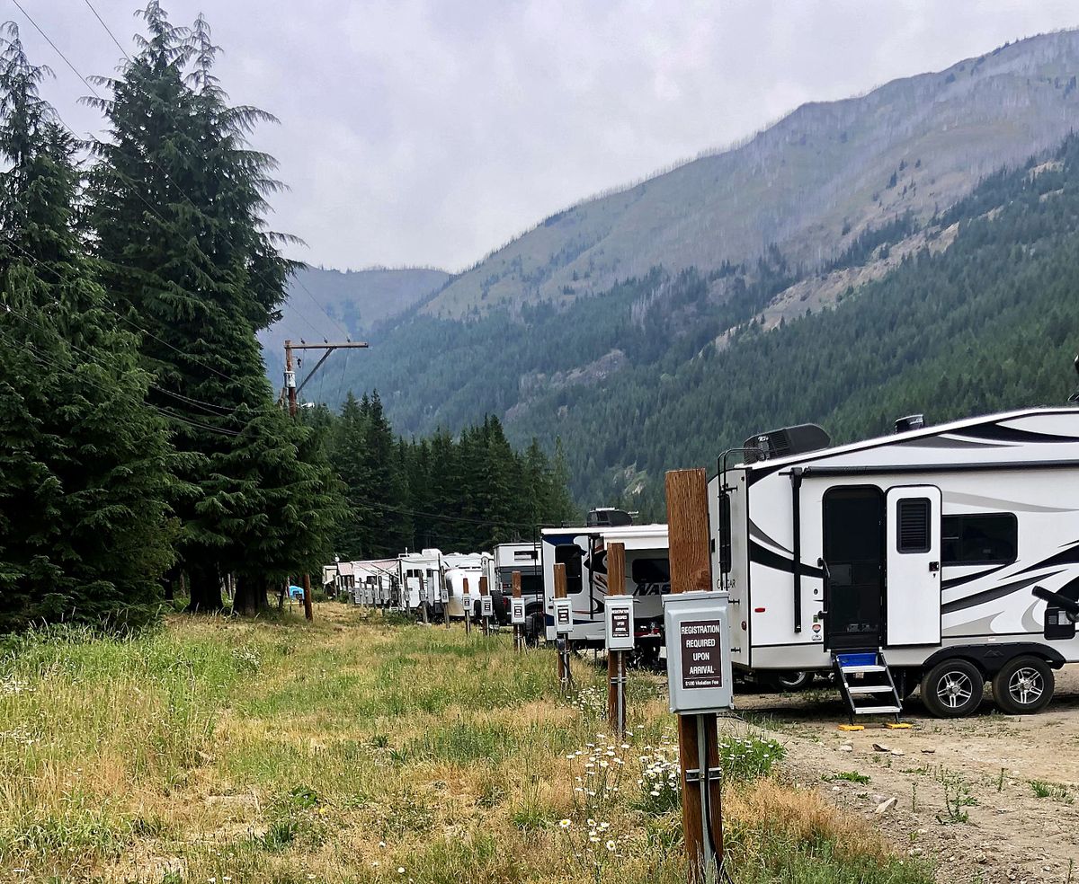 RVs are parked on the edge of the B Lot at Crystal Mountain, where electricity is available. (Leslie Kelly)