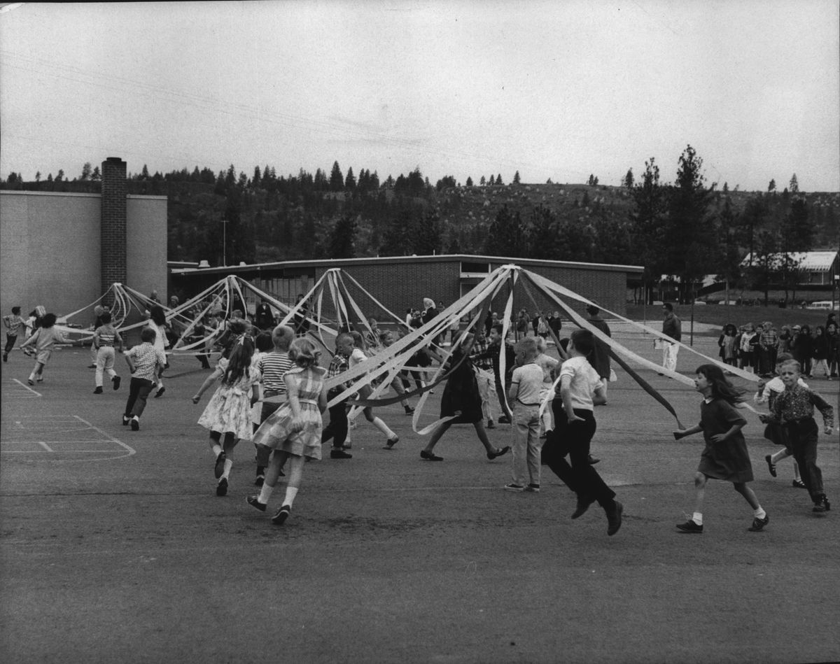 Students participate in a May Pole dance at Linwood Elementary School in 1967 in north Spokane.  (Spokesman-Review photo archives)