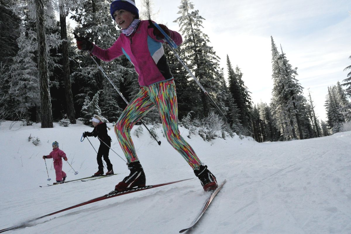 Linnea Sunderman, who teamed with her mom, Lisa J. Sunderman, streaks out from the starting line in the Doughnut Dash -- one of the Winterfest events. — at Mount Spokane State Park. (Rich Landers)
