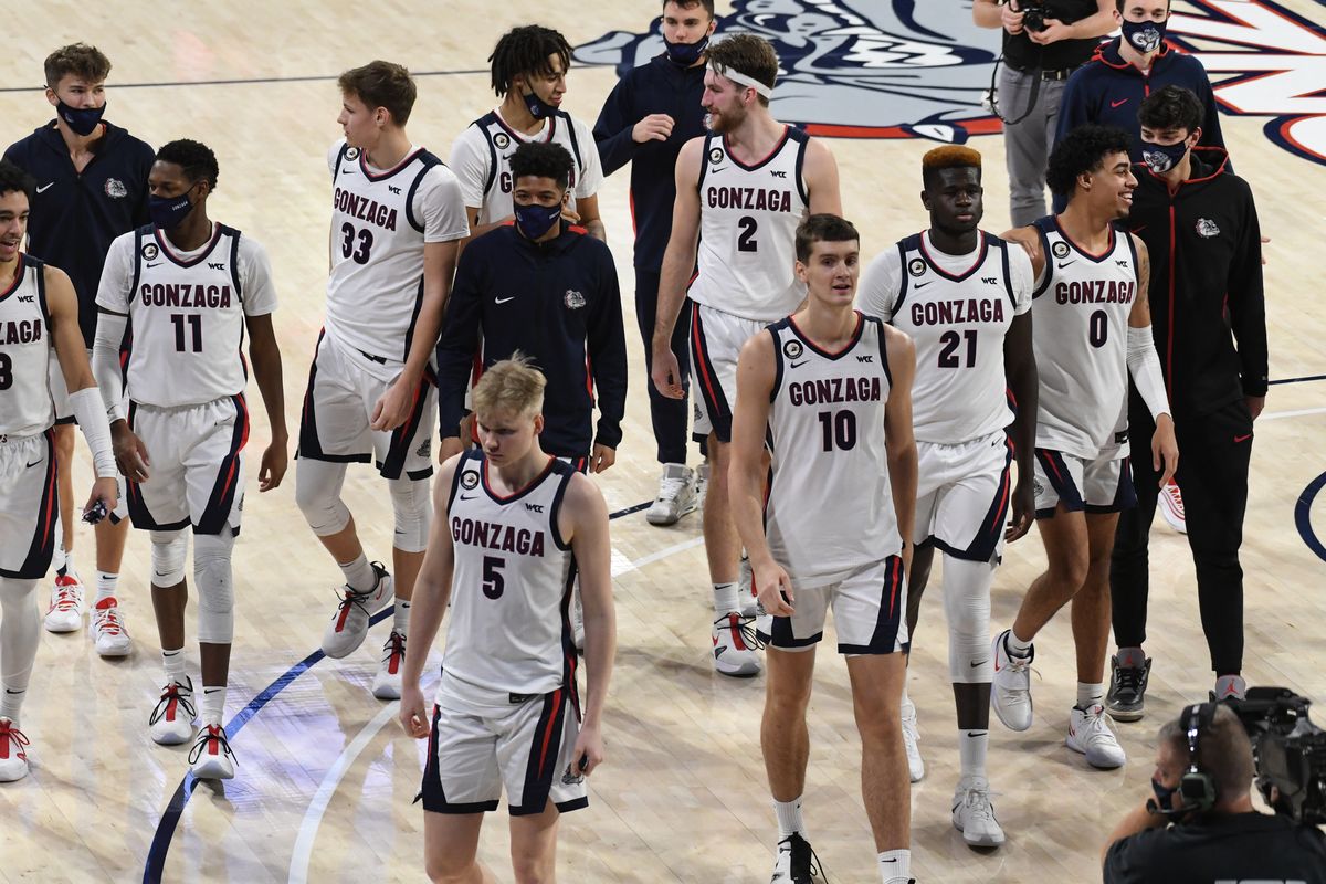 Gonzaga heads off the court after defeating BYU 86-69 during the second half of an NCAA college basketball game, Thurs., Jan. 7, 2021, in the McCarthey Athletic Center.  (Colin Mulvany/THE SPOKESMAN-REVIEW)