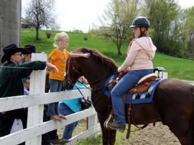 
Wheatland Dreamwalker, a Morgan stallion ridden by his trainer Chelsea Enos, greets fans at the showcase in 2007. Photo courtesy of Dragoon Studios
 (Photo courtesy of Dragoon Studios / The Spokesman-Review)