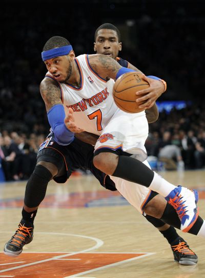 Carmelo Anthony made 23 of 35 shots in scoring a career-high and franchise-record 62 points. (Associated Press)