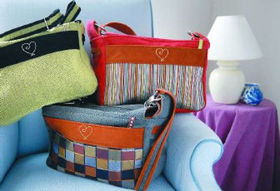 
A sample of Cherie Killilea's Studio Cherie bags are shown in Killilea's Indian Trail home. 
 (Dan Pelle / The Spokesman-Review)