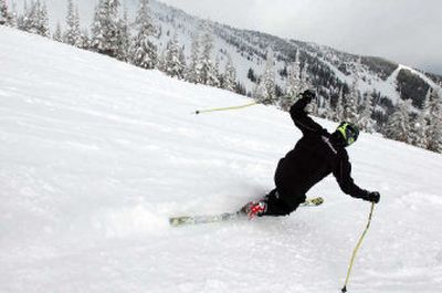 
Jakub Cernohorsky, of the Czech Republic, heads down  a run at Schweitzer Mountain Resort on Thursday in a trademark telemark crouch. 
 (Jesse Tinsley / The Spokesman-Review)