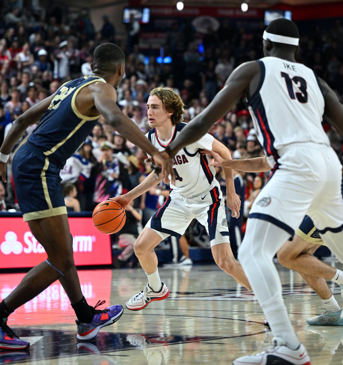 Gonzaga wing Dusty Stromer (4) dribbles the ball toward the lane during the first half Tuesday against Eastern Oregon.  (By Colin Mulvany/The Spokesman-Review)