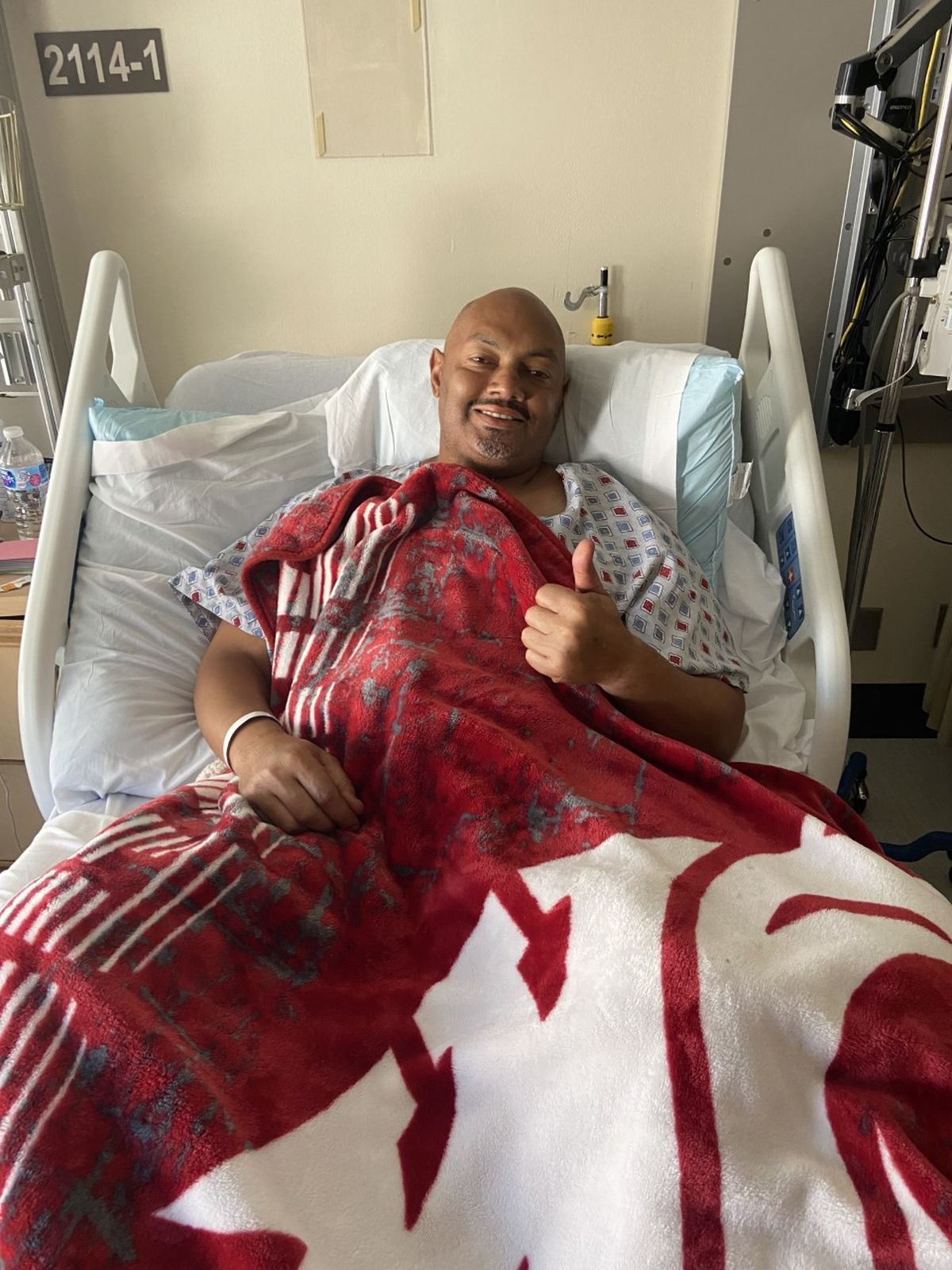 Former Washington State running back Derek Sparks has a piece of his alma mater with him as he rests in a hospital bed in Houston. Sparks is battling pancreatic cancer after being diagnosed with the disease in August.  (Derek Sparks/Courtesy)