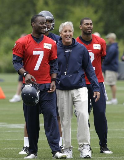 Quarterback Tarvaris Jackson is back with head coach Pete Carroll and the Seattle Seahawks. (Associated Press)