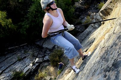 Jessica Ankney rappels down the side of a cliff at Q’emiln Park in Post Falls last month. She is part of NIC’s new ROTC Program.  (Kathy Plonka / The Spokesman-Review)