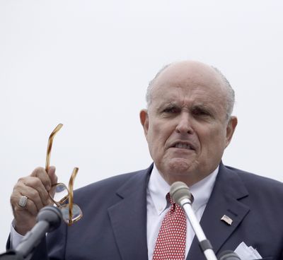 FILE - In a Wednesday, Aug. 1, 2018 file photo, Rudy Giuliani, an attorney for President Trump, speaks during campaign event for Eddie Edwards, who is running for the U.S. Congress in New Hampshire, in Portsmouth, N.H. Truth isnt truth, says President Donald Trumps personal attorney Rudy Giuliani, as he explained why hes wary about pushing the president into an interview that he says could be a perjury trap. Giuliani used the line truth isnt truth Sunday, Aug. 19, 2018, on NBC's