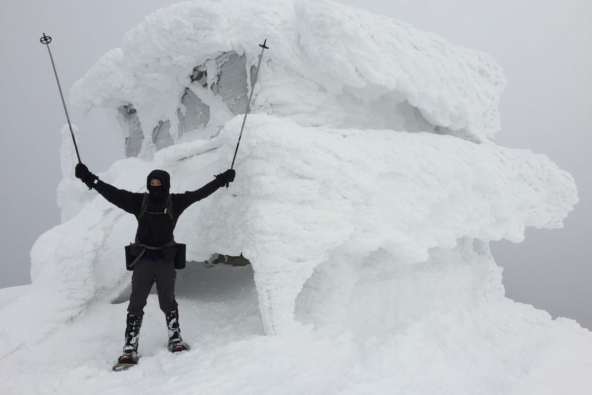 Tyler Nyman celebrates reaching Star Peak Lookout on snowshoes. (Shuwen Wang)