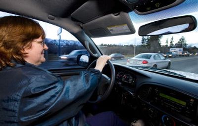 
Peggy Gilmore, of East Wenatchee, who works at the North Central Regional Library's downtown headquarters, has adjusted her work schedule to avoid the worst of the traffic congestion. 
 (Associated Press / The Spokesman-Review)