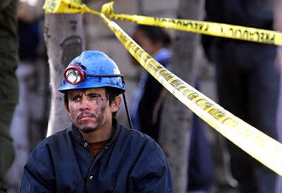 
Calling the 65 trapped miners his brothers, coal miner Julian Rodriguez vowed to not leave the site until all were accounted for. 
 (Associated Press / The Spokesman-Review)