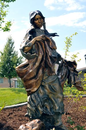 The statue, called Berry Picker, is an enlarged replica of a small bronze by the late artist Nancy McLaughlin.
