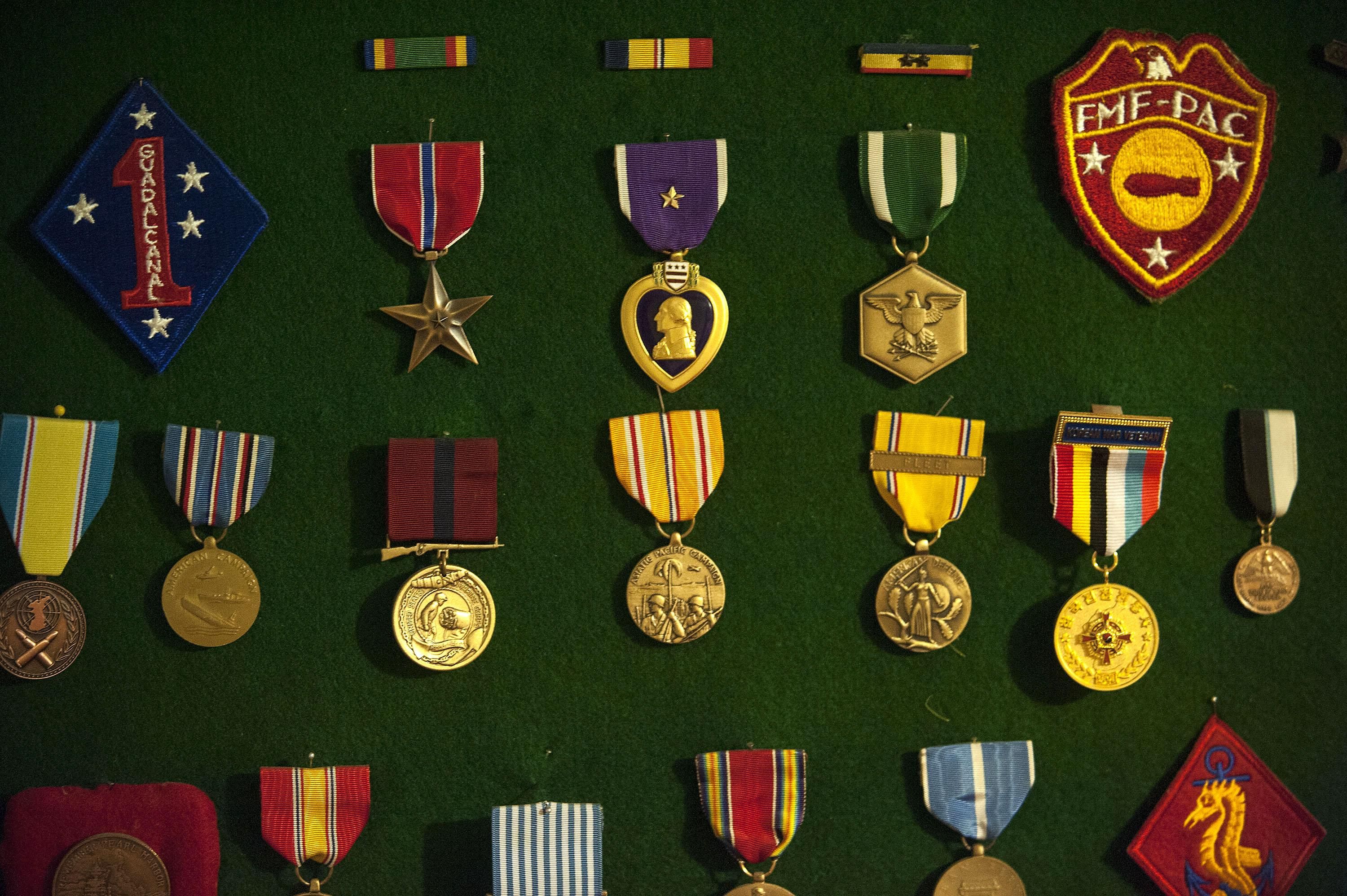 Pearl Harbor survivor Ray Garland's medals are on display in the basement of his home in Coeur d'Alene on July 8, 2016. (Kathy Plonka / The Spokesman-Review)