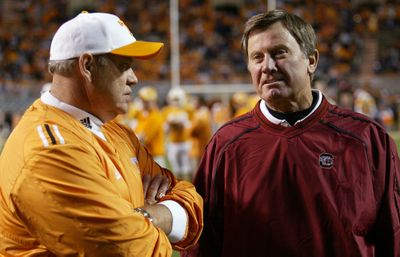 Associated Press Phillip Fulmer, left, and struggling Tennessee face South Carolina and coach Steve Spurrier on Saturday night. (Associated Press / The Spokesman-Review)