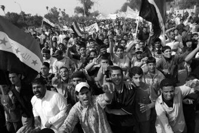 
People protest in Basra, Iraq, on Monday. Thousands upset about poor city services marched peacefully through the streets of Iraq's second largest city of Basra on Monday, demanding the provincial governor's resignation despite calls by top government officials a day earlier to call off the protest(AP Photo/Nabil al-Jurani) ORG XMIT: BAG103
 (Associated Press / The Spokesman-Review)