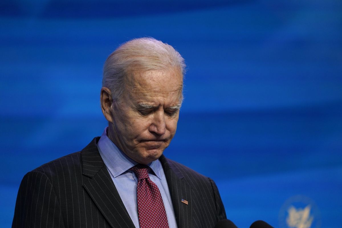 FILE - In this Jan. 8, 2021, file photo President-elect Joe Biden speaks during an event at The Queen theater in Wilmington, Del. When Biden takes office later this month, his biggest challenge may be navigating a deeply divided country past the turmoil of the Trump era.  (Susan Walsh)
