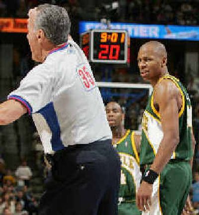 
Sonics guard Ray Allen shows his displeasure while receiving a technical foul from official Jack Nies. 
 (Associated Press / The Spokesman-Review)