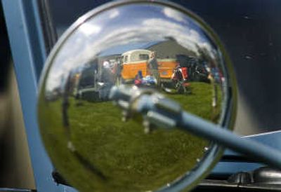 
A shiny rearview mirror reflects some of the Volkswagens on display Sunday. 
 (Christopher Anderson / The Spokesman-Review)