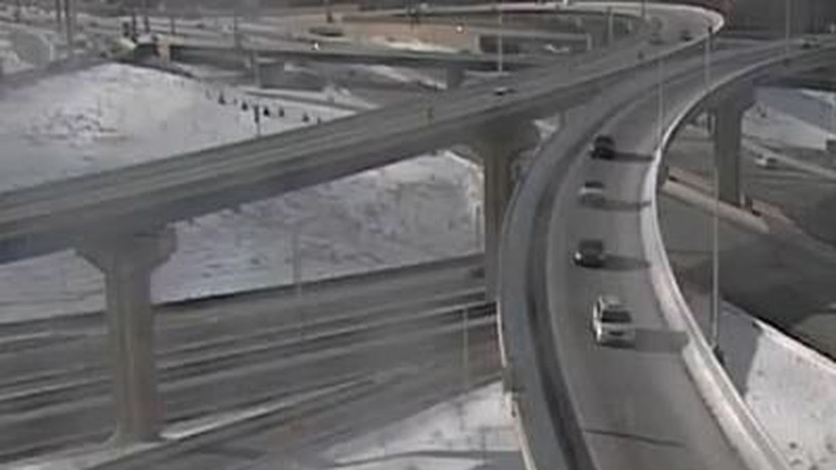 Wisconsin authorities say a pickup truck driver survived after plunging 70 feet off an elevated highway. Officials say the driver lost control, traveled up a snowbank and over a barrier wall. The truck landed on a distress lane of Interstate 94. 