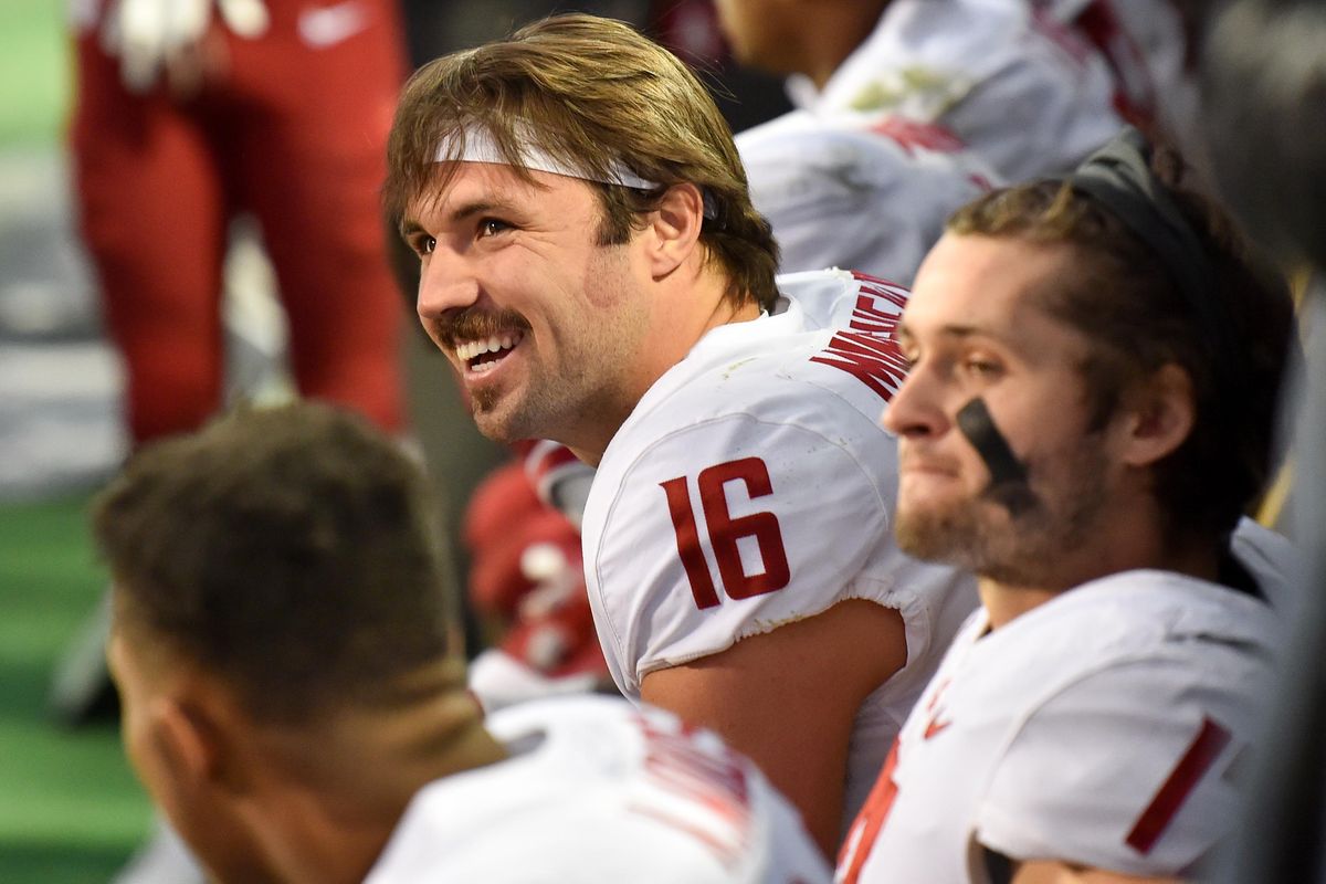 Washington State  quarterback Gardner Minshew  was all smiles as the game against Colorado wound down  Nov. 10 at Folsom Field in Boulder Colo. WSU won 31-7. (Tyler Tjomsland / The Spokesman-Review)