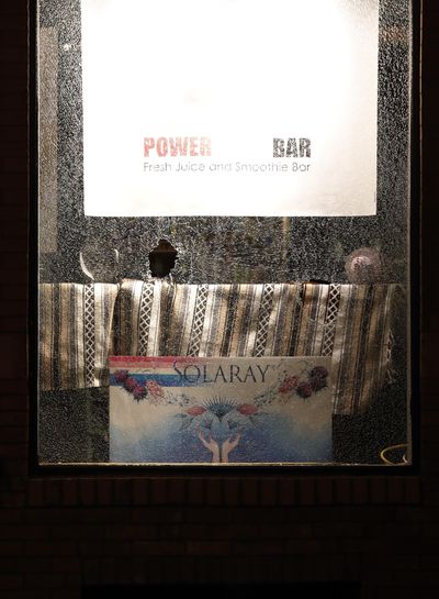 A broken window is seen at a business as protesters gather, Friday, Sept. 15, 2017, in St. Louis., after a judge found a white former St. Louis police officer, Jason Stockley, not guilty of first-degree murder in the death of a black man, Anthony Lamar Smith, who was fatally shot following a high-speed chase in 2011. (AP Photo/Jeff Roberson) ORG XMIT: ILKS155 (Jeff Roberson / Associated Press)