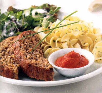 
Turkey Meatloaf is served with Roasted Red Pepper Tomato Sauce, with noodles and snap peas as accompaniments, as part of a low-fat menu in 