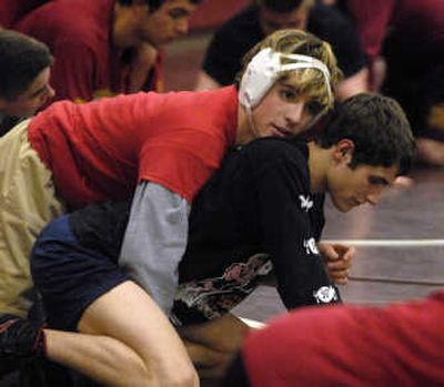 
University High School's Anthony Rivera, a senior 119-pound wrestler, practices Dec. 17
 (J. BART RAYNIAK / The Spokesman-Review)