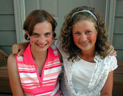 
Madeline Dodge, 12, left, and Genavive Dodge, 14, are both home-schooled. Madeline in a dancer. Genavive is a photographer and sells her photos at the Liberty Lake Farmers' Market. 
 (PHOTO BY JENNIFER LARUE / The Spokesman-Review)