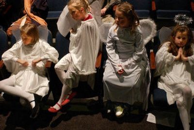 
Cast members listen to director Judy Brendor as she goes over stage notes for 