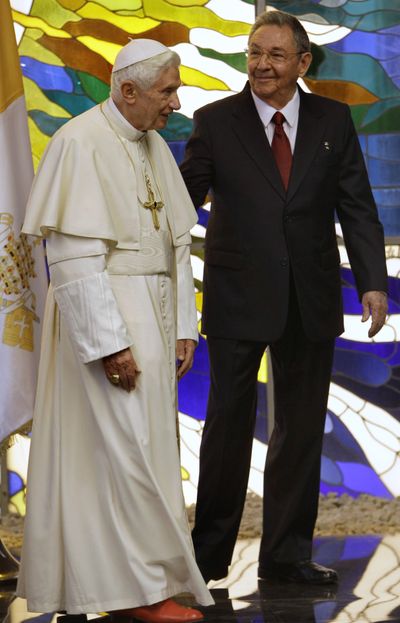 Pope Benedict XVI and Cuba’s President Raul Castro talk after a meeting in Havana, Cuba, Tuesday. (Associated Press)