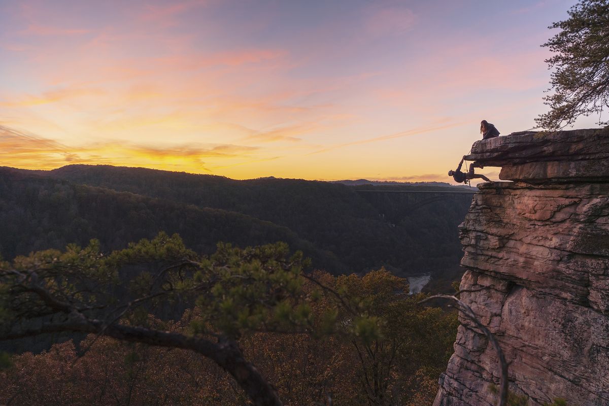 Rock climbers, along with whitewater enthusiasts and other adventurers, have long prized West Virginia’s New River Gorge, which was designated as a national park and preserve in December.  (West Virginia Tourism Office)