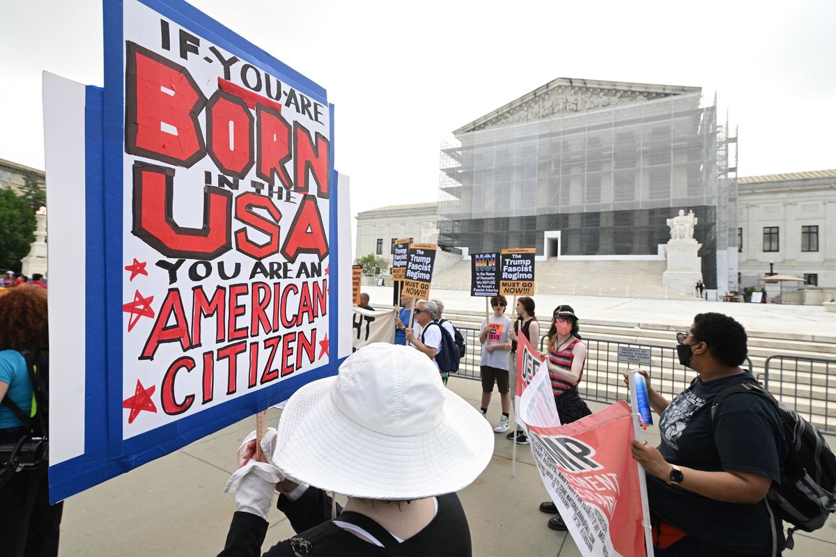 People demonstrate outside the Supreme Court on Thursday in Washington. MUST CREDIT: Matt McClain/The Washington Post (Matt McClain/The Washington Post)