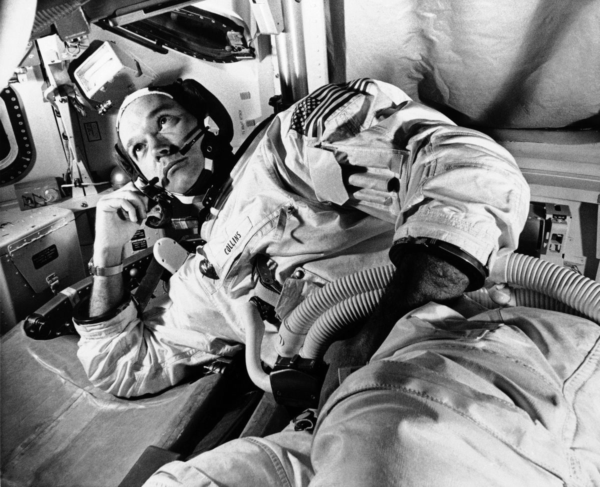FILE - In this June 19, 1969 file photo, Apollo 11 command module pilot astronaut Michael Collins takes a break during training for the moon mission, in Cape Kennedy, Fla. Collins, who piloted the ship from which Neil Armstrong and Buzz Aldrin left to make their historic first steps on the moon in 1969, died Wednesday, April 28, 2021, of cancer, his family said. He was 90.  (STF)
