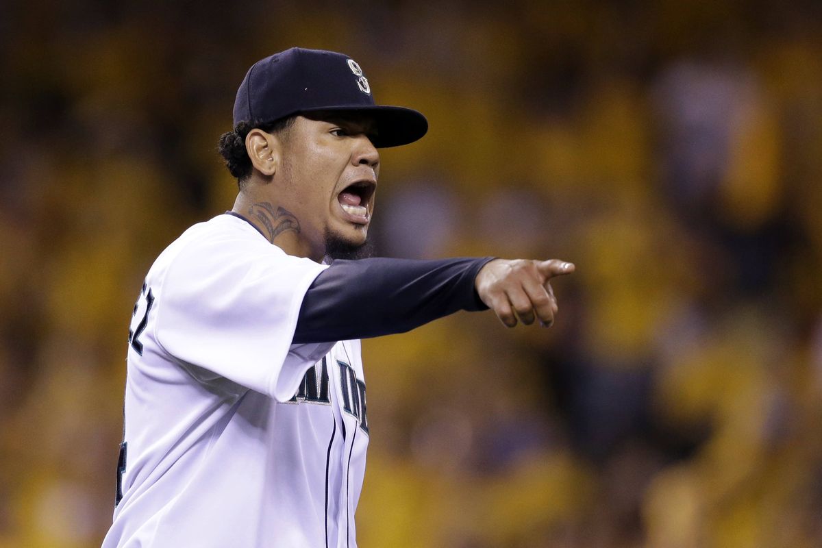 Mariners starterFelix Hernandez lets out a yell after the final out in the eighth inning. The Mariners beat the Braves 4-2. (Associated Press)