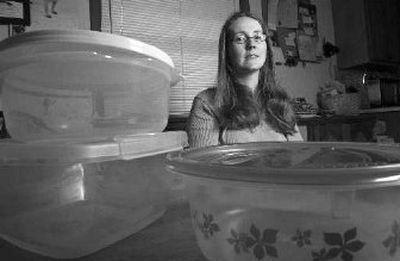
Jeannette Wright, of West Allis, Wis., reuses plastic food containers. Still, she estimates she spends about $8 a month on replacements. 
 (Associated Press / The Spokesman-Review)