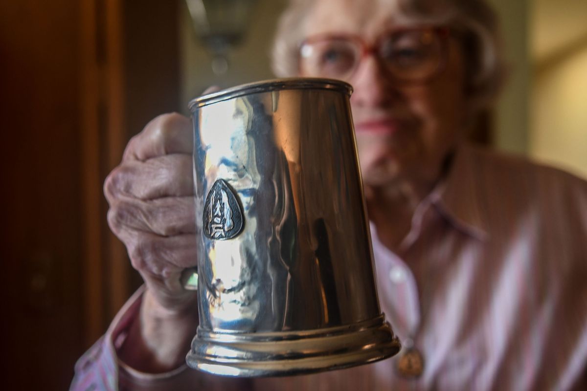“This mug has been all over the world,” says Lois Richards about her Camp Sweyolakan five year counselor mug during an interview in Spokane on Tuesday, April 12, 2022.  (Kathy Plonka/The Spokesman-Review)