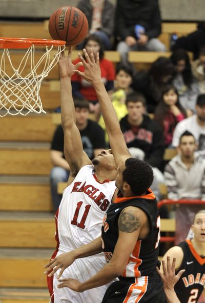 Eastern Washington University senior guard Cliff Colimon finds a path to the basket during the Idaho State University game on Senior Night at Reese Court last Tuesday. Colimon was named to the All-Big Sky first team on Thursday. (Dan Pelle)