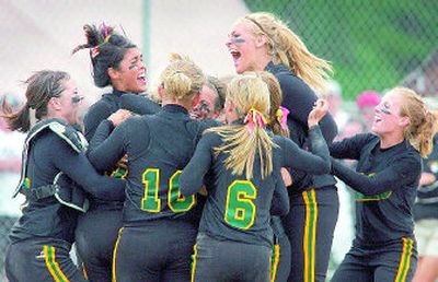 
Shadle Park's players found a reason to shout after defeating Mountain View in the State 4A softball championship game. 
 (Janet Jensen Tacoma News Tribune / The Spokesman-Review)