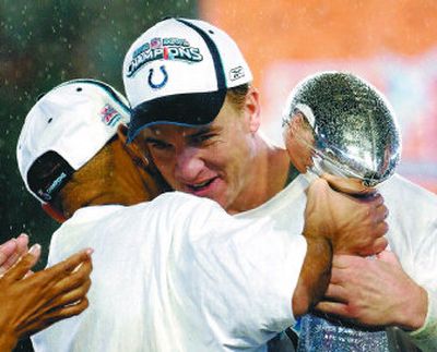 
Indianapolis coach Tony Dungy, left, hugs Colts QB Peyton Manning after their 29-17 win over the Chicago Bears in Super Bowl XLI at Dolphin Stadium in Miami. 
 (Associated Press / The Spokesman-Review)