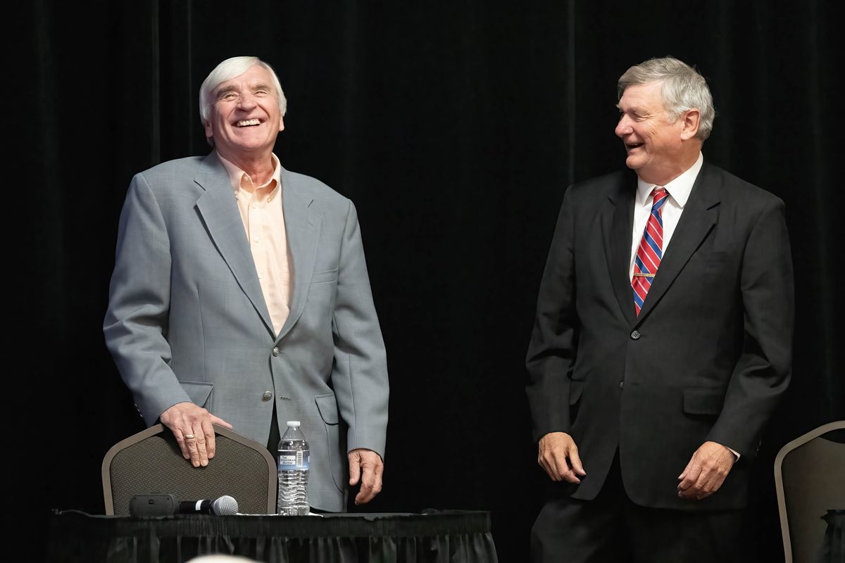 Spokane Valley City Councilman Tim Hattenburg, left, and former state Rep. Rob Chase have a conversation before their debate Oct. 26 debate hosted by The Spokesman-Review at the Mirabeau Park Hotel and Convention Center.  (Colin Mulvany/The Spokesman-Review)