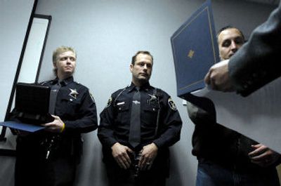 
Idaho State Police troopers, from left, Holly Branch, Jeff Jayne and Paul Burke were honored at the ISP  office in Coeur d'Alene on Thursday for their high number of DUI arrests. 
 (Kathy Plonka / The Spokesman-Review)