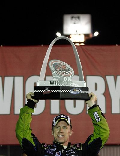 Carl Edwards hoists his third trophy at Gateway International Raceway after winning the Missouri-Illinois Dodge Dealers 250. (Photo courtesy  Jason Smith/Getty Images) (Jason Smith / Getty Images North America)
